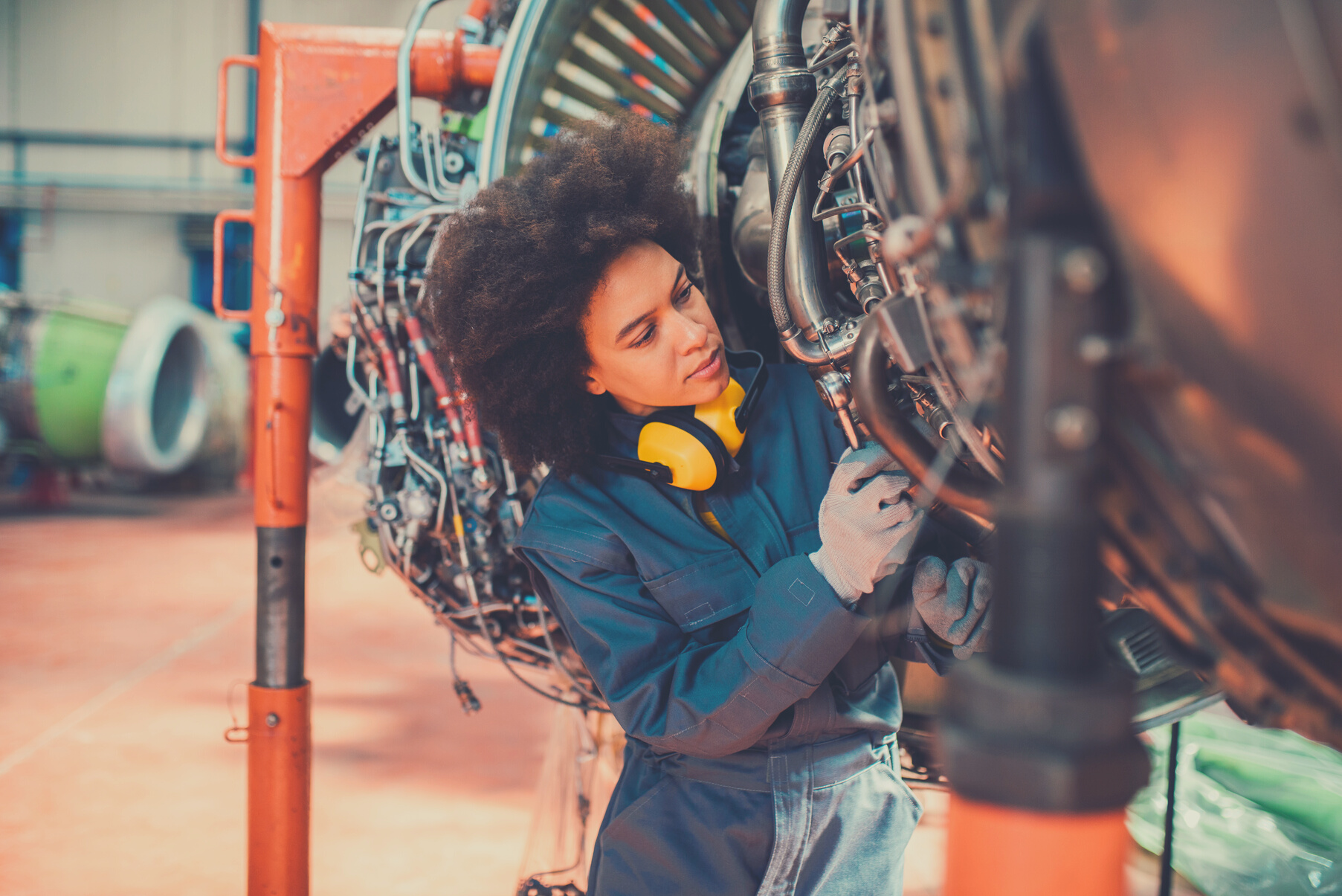 Female aircraft mechanic